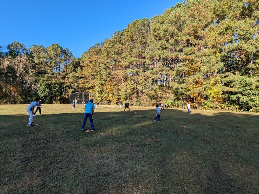 Young cricketers training at a club net session